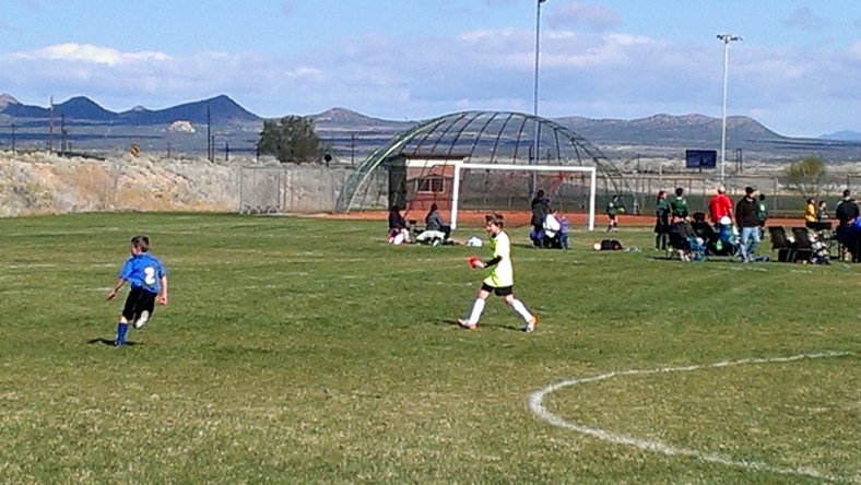 Ben holding red card